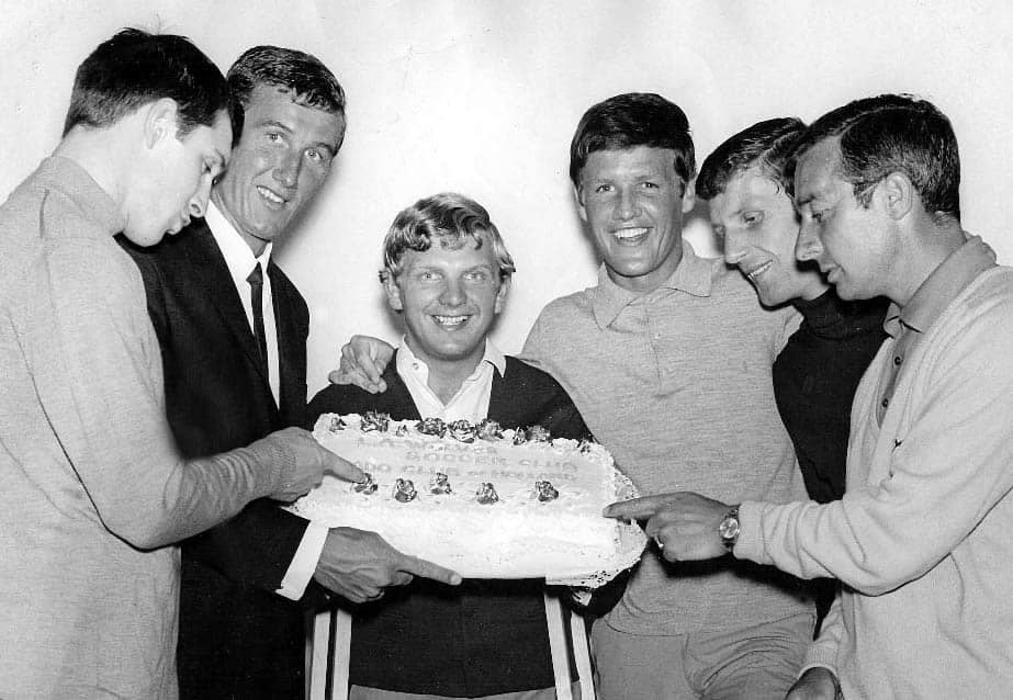 LA Wolves players holding a cake